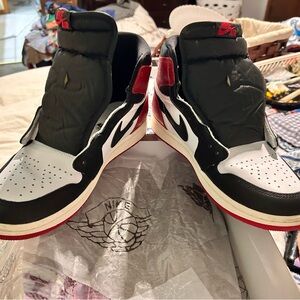 Nike Air Men's Black, White, and Red Jordan 1 Retro Sneakers